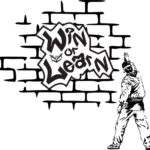 Image of a tagger painting the theme title Win or Learn on a wall.